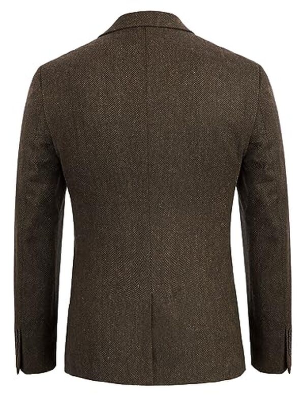 Plongez dans l'élégance intemporelle de la veste tweed PJ Paul Jones. Parfait pour un look vintage sophistiqué, ce blazer marron foncé vous séduira par sa qualité et son style.